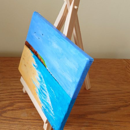 Filey Brigg hand painted canvas with easel for display
