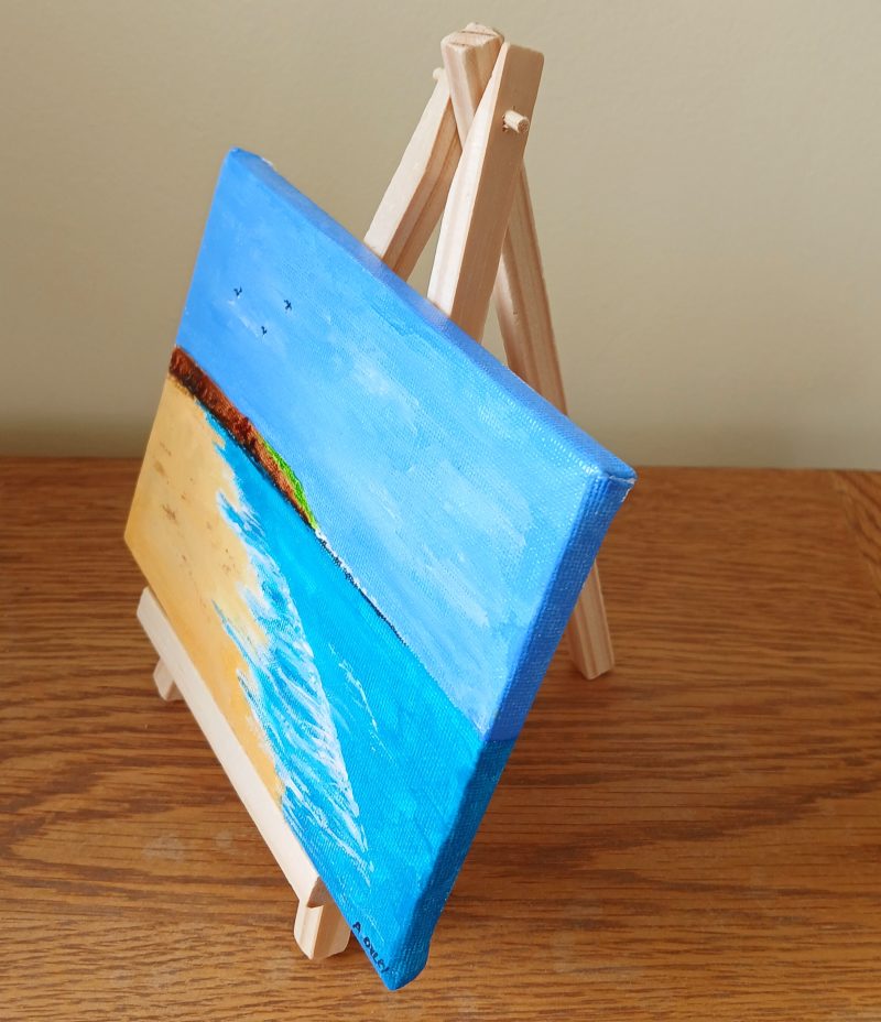 Filey Brigg hand painted canvas with easel for display