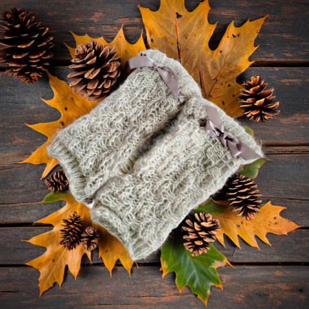 Light grey mittens with thumb hole and grey satin bow detail on the wrist