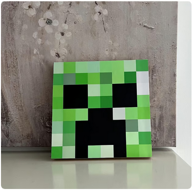 Green Pixel Monster Face Plaque – Retro Game-Inspired Wall Art