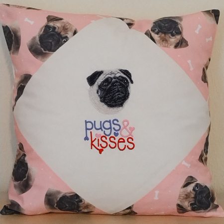 Hand made embroidered cushion with a Pug design.
