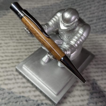 Hand-turned wooden Epsilon style pen made from walnut with chrome fittings and a high gloss finish