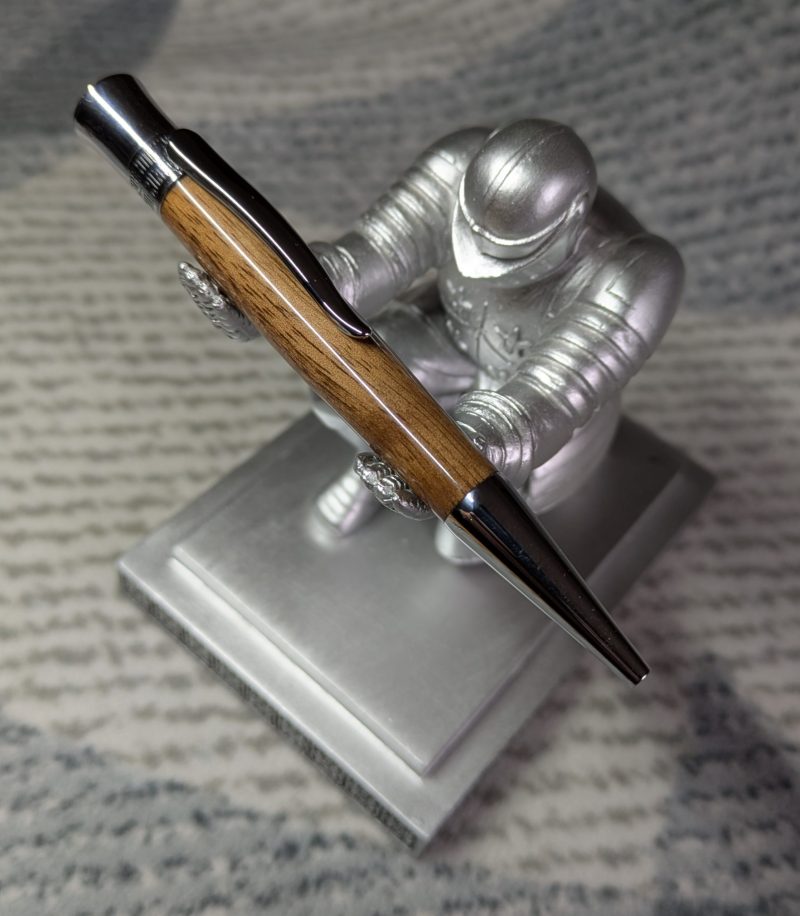 Hand-turned wooden Epsilon style pen made from walnut with chrome fittings and a high gloss finish