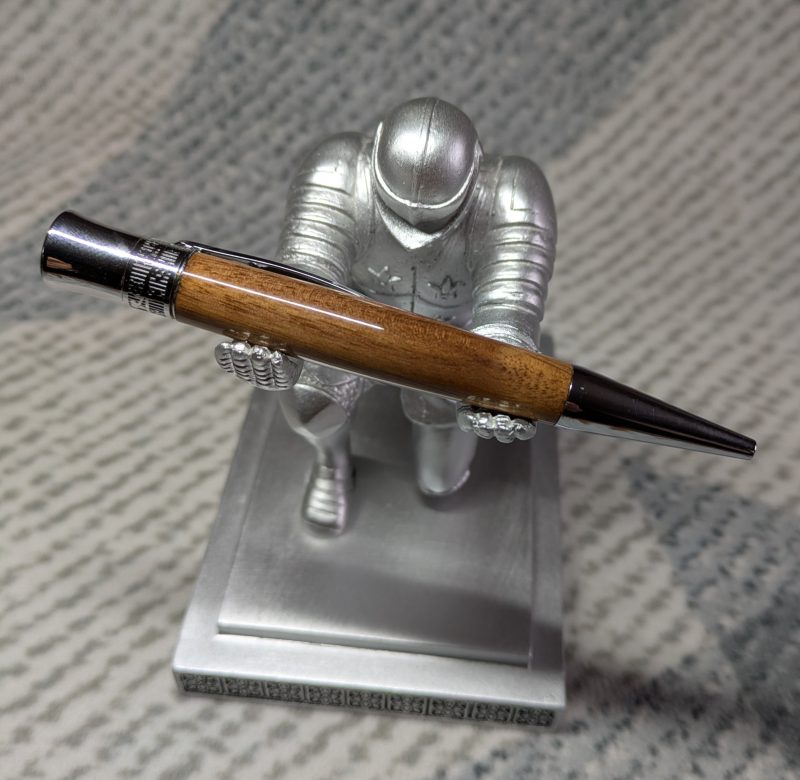 Hand-turned wooden Epsilon style pen made from walnut with chrome fittings and a high gloss finish