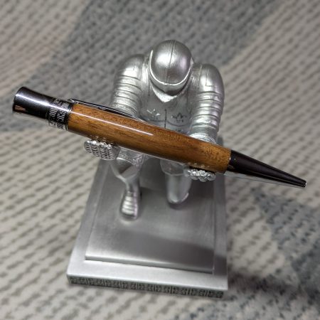 Hand-turned wooden Epsilon style pen made from walnut with chrome fittings and a high gloss finish