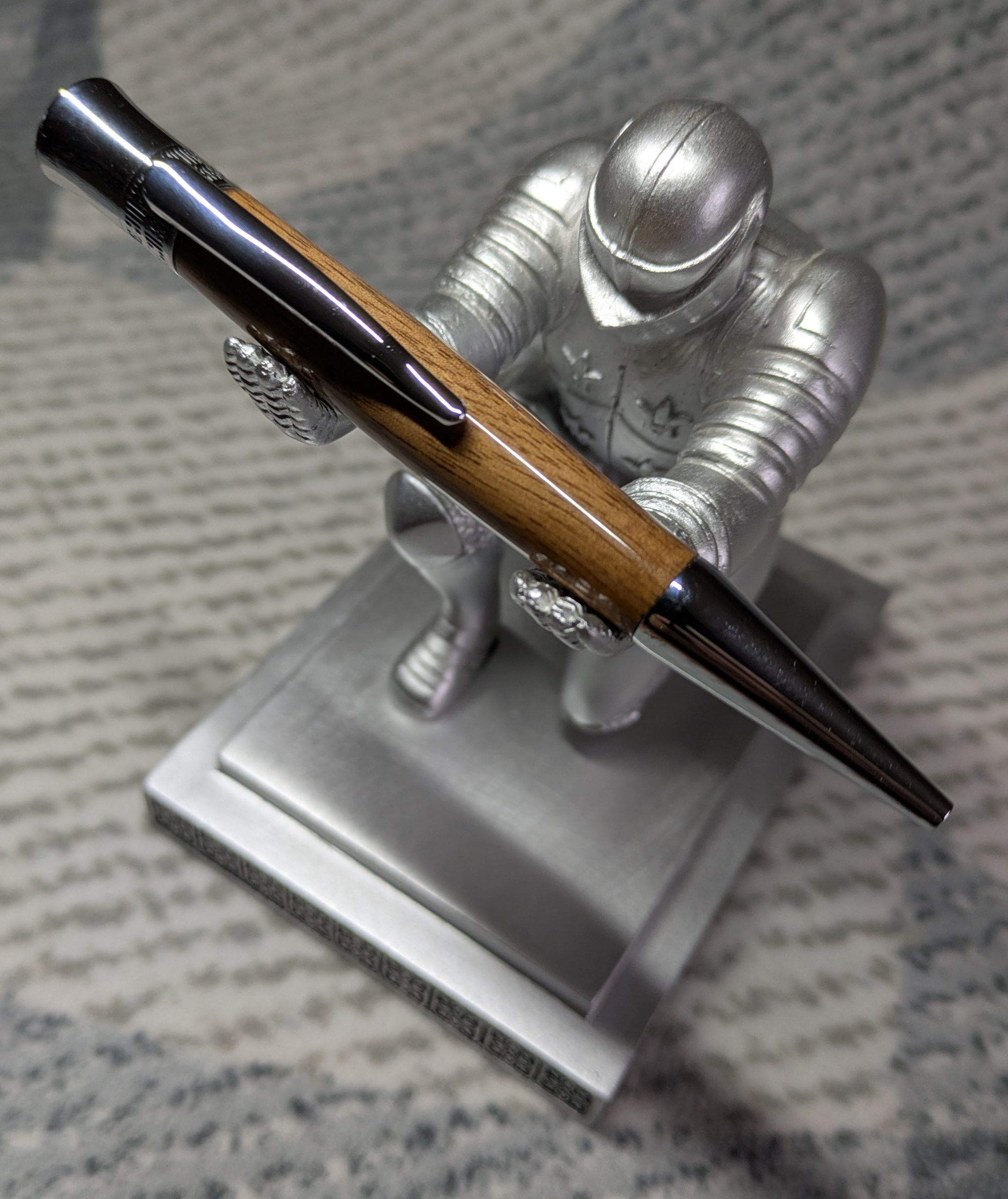 Hand-turned wooden Epsilon style pen made from walnut with chrome fittings and a high gloss finish