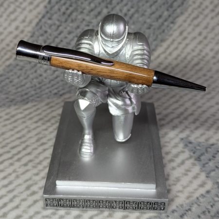 Hand-turned wooden Epsilon style pen made from walnut with chrome fittings and a high gloss finish