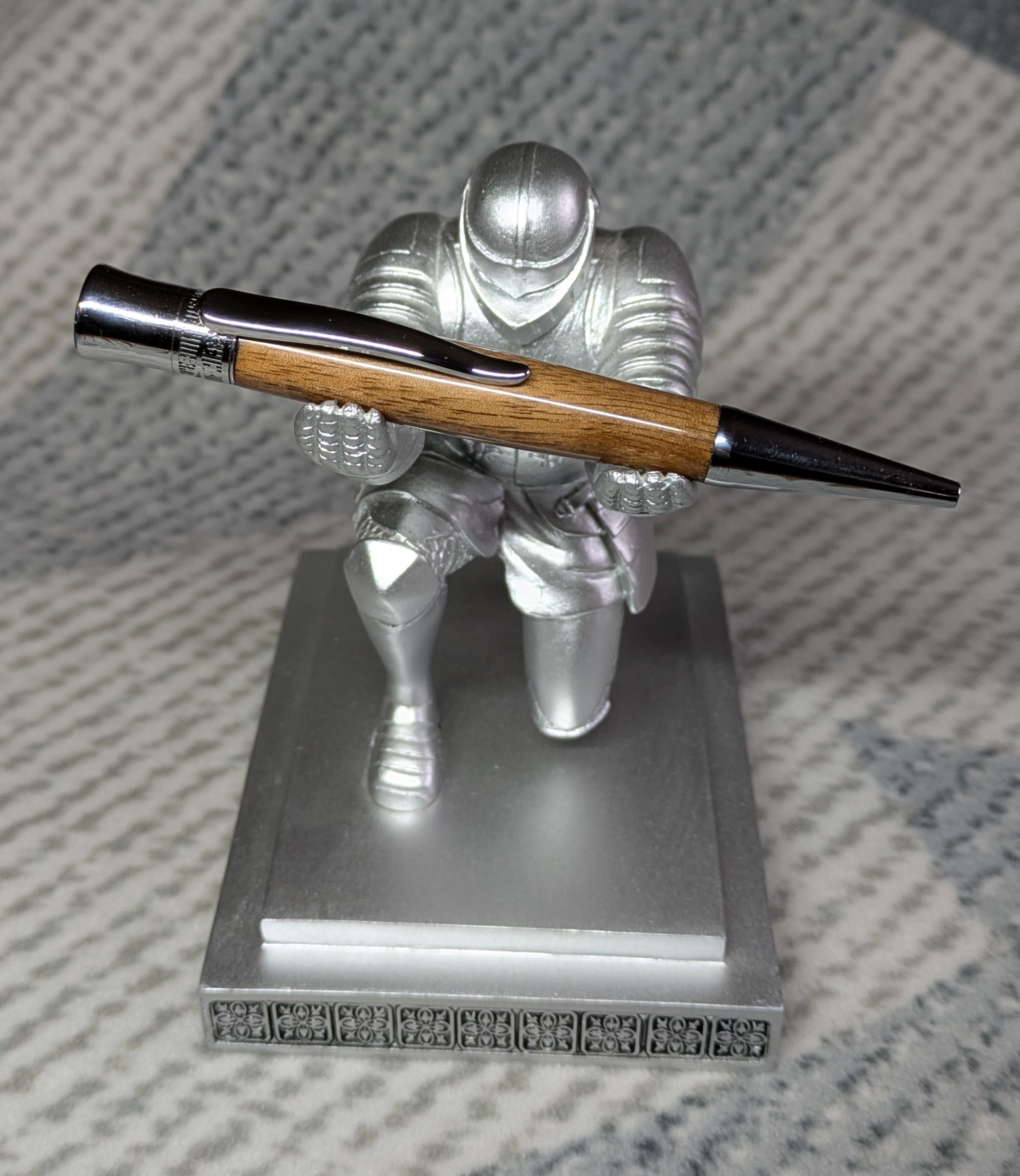 Hand-turned wooden Epsilon style pen made from walnut with chrome fittings and a high gloss finish