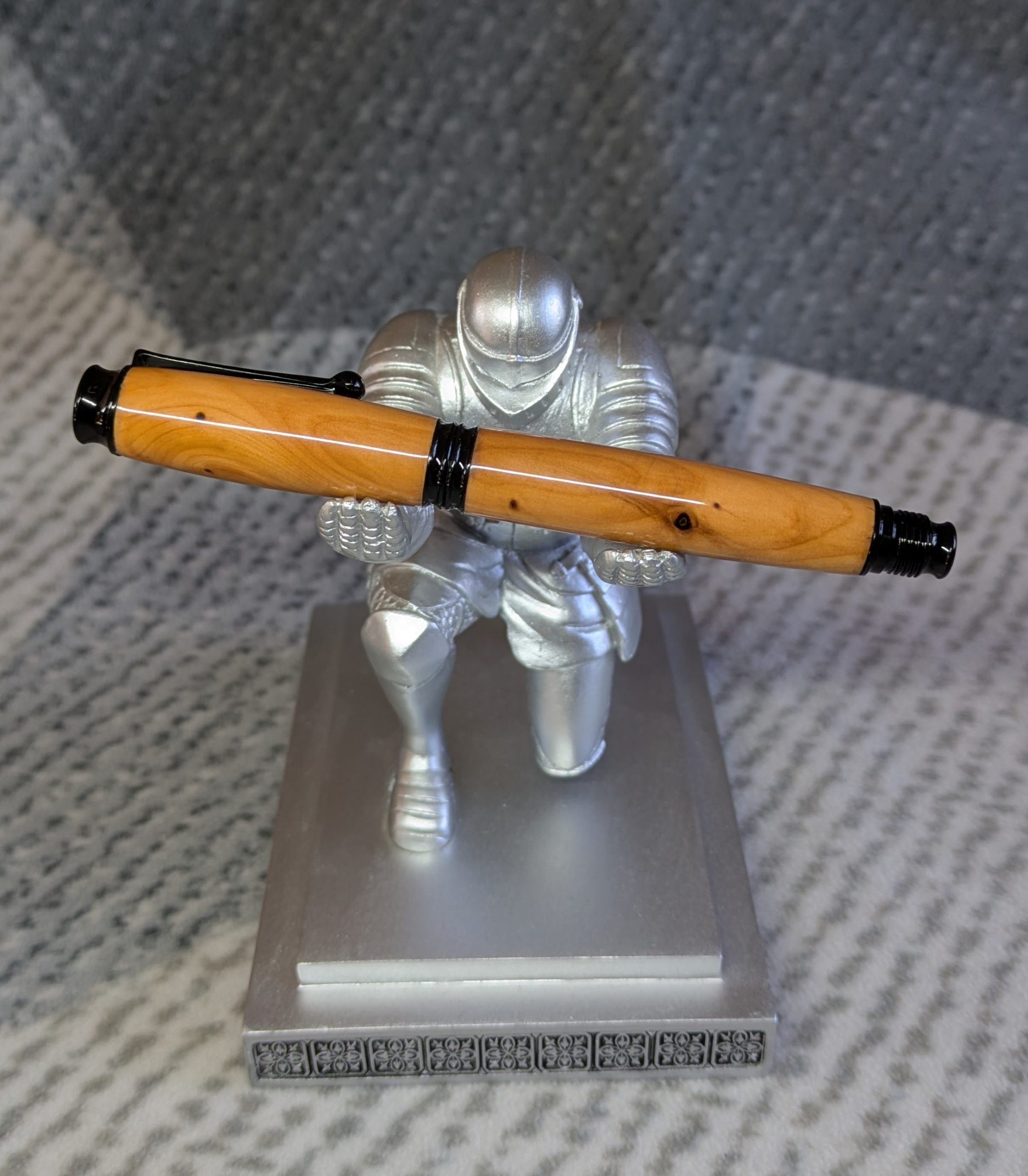 Omega style wooden rollerball made from yew with black fittings