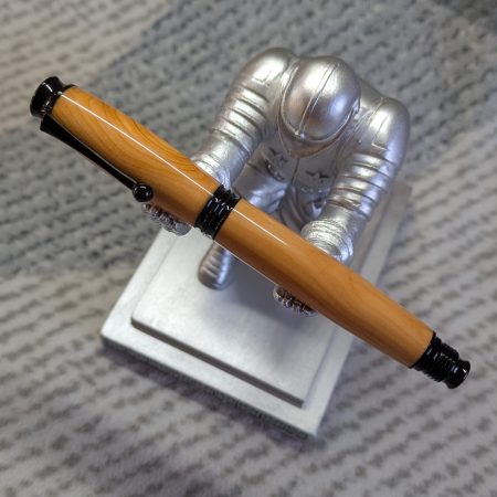 Omega style wooden rollerball made from yew with black fittings