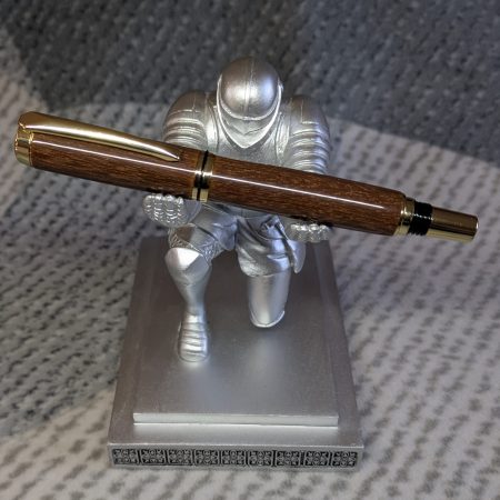 Wooden fountain pen made from gombeira wood with gold coloured fittings