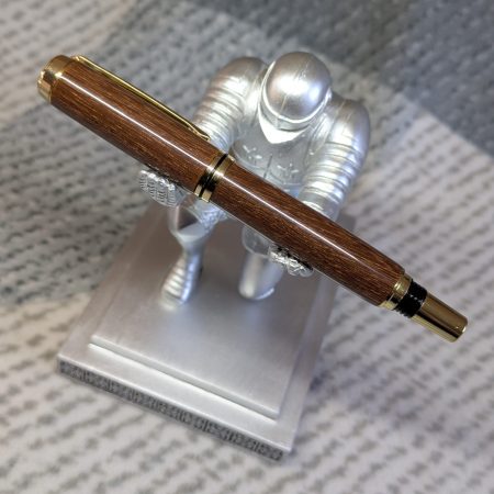 Wooden fountain pen made from gombeira wood with gold coloured fittings