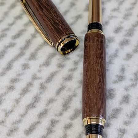 Wooden fountain pen made from gombeira wood with gold coloured fittings