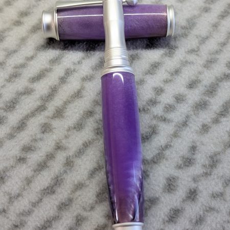 Omega style fountain pen made from purple acrylic with satin silver fittings
