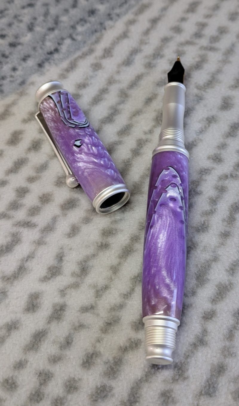 Omega style fountain pen made from purple acrylic with satin silver fittings
