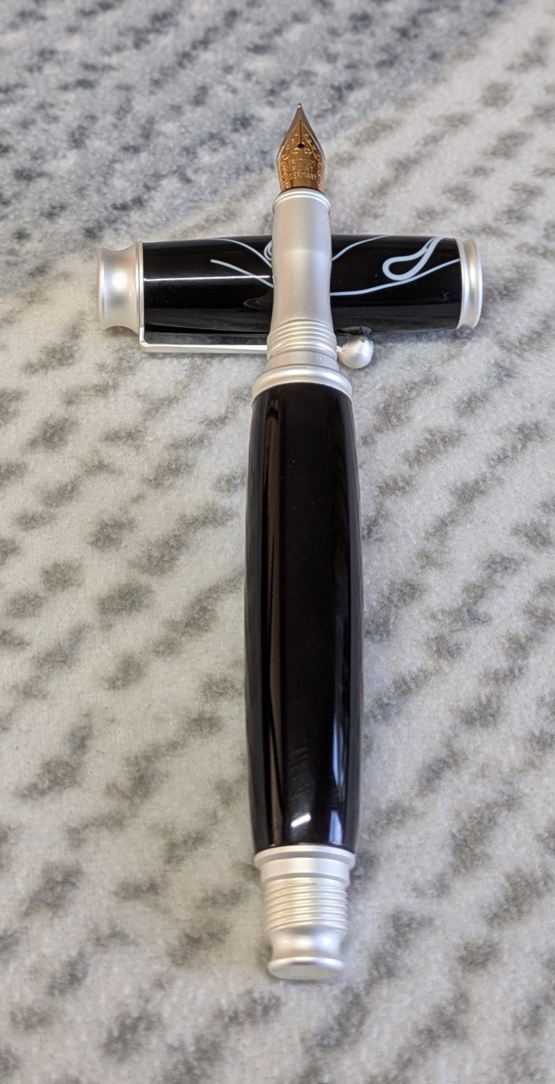 Omega style fountain pen in black acrylic with satin silver fittings