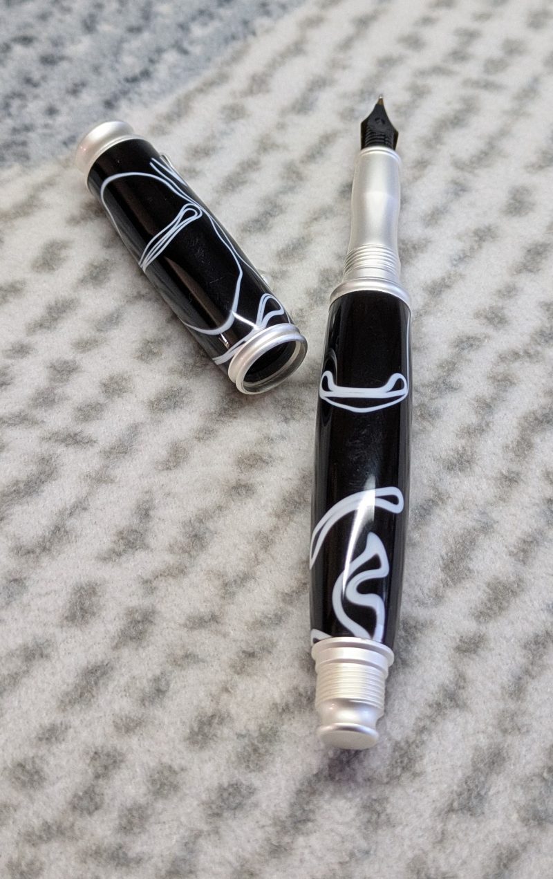 Omega style fountain pen in black acrylic with satin silver fittings