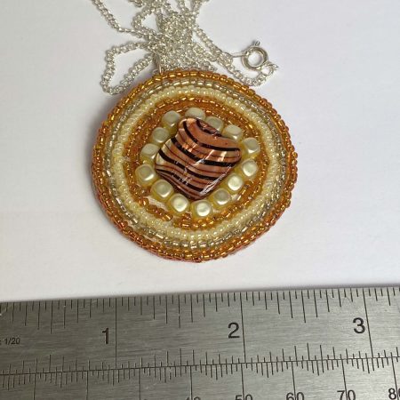 Clearance Pendant: Hand beaded medallion with shell bead at centre