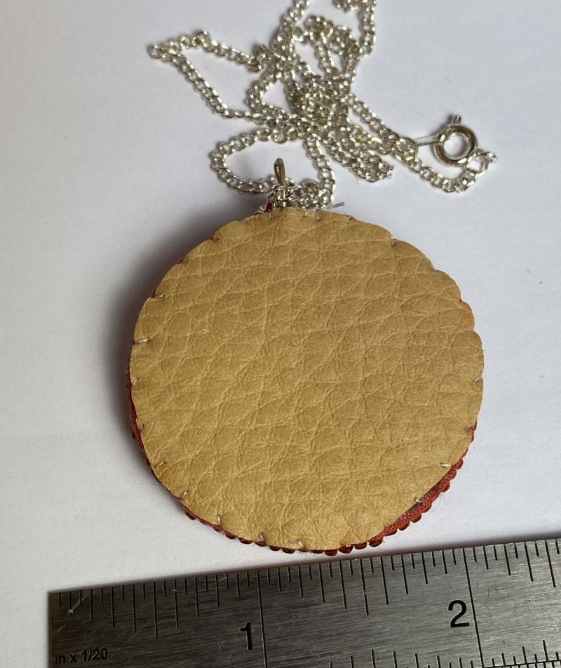 Clearance Pendant: Hand beaded medallion with shell bead at centre