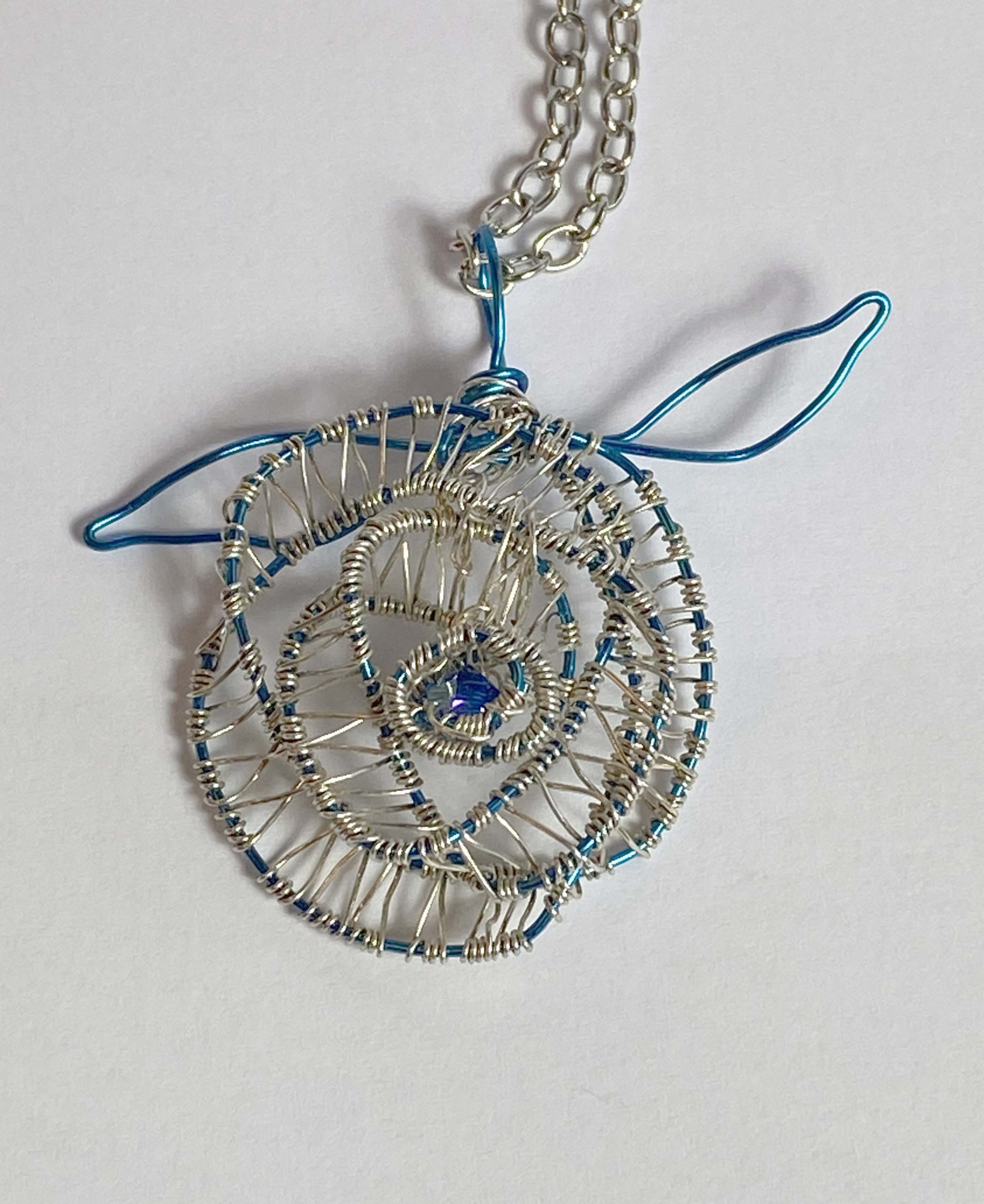Hand-made blue/silver coloured wire rose