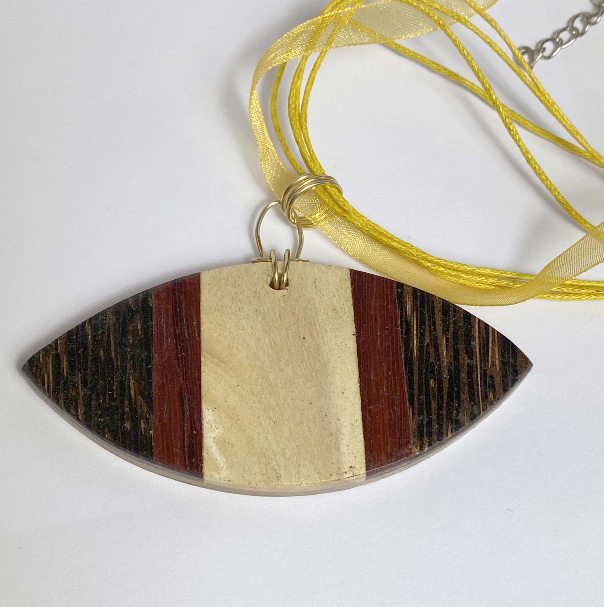 Clearance Pendant: Unusual large wooden pendant on yellow ribbon/cord