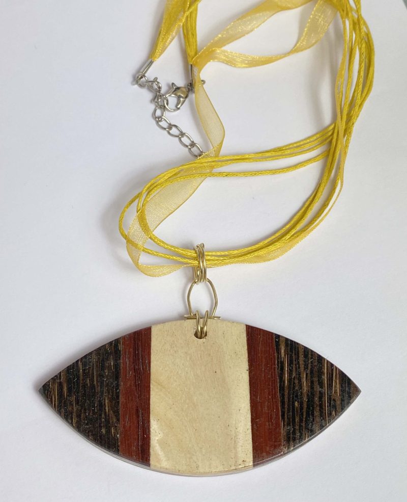 Clearance Pendant: Unusual large wooden pendant on yellow ribbon/cord