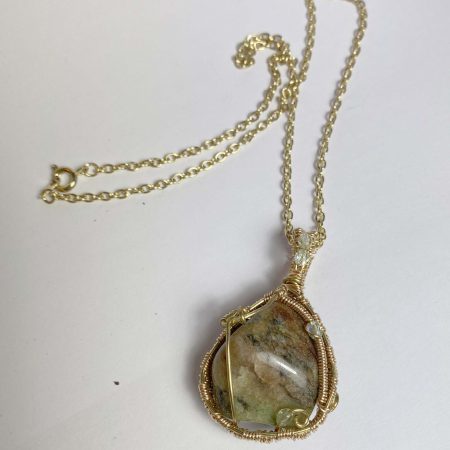 Clearance Pendant: Tumbled natural agate wrapped in gold col. wire