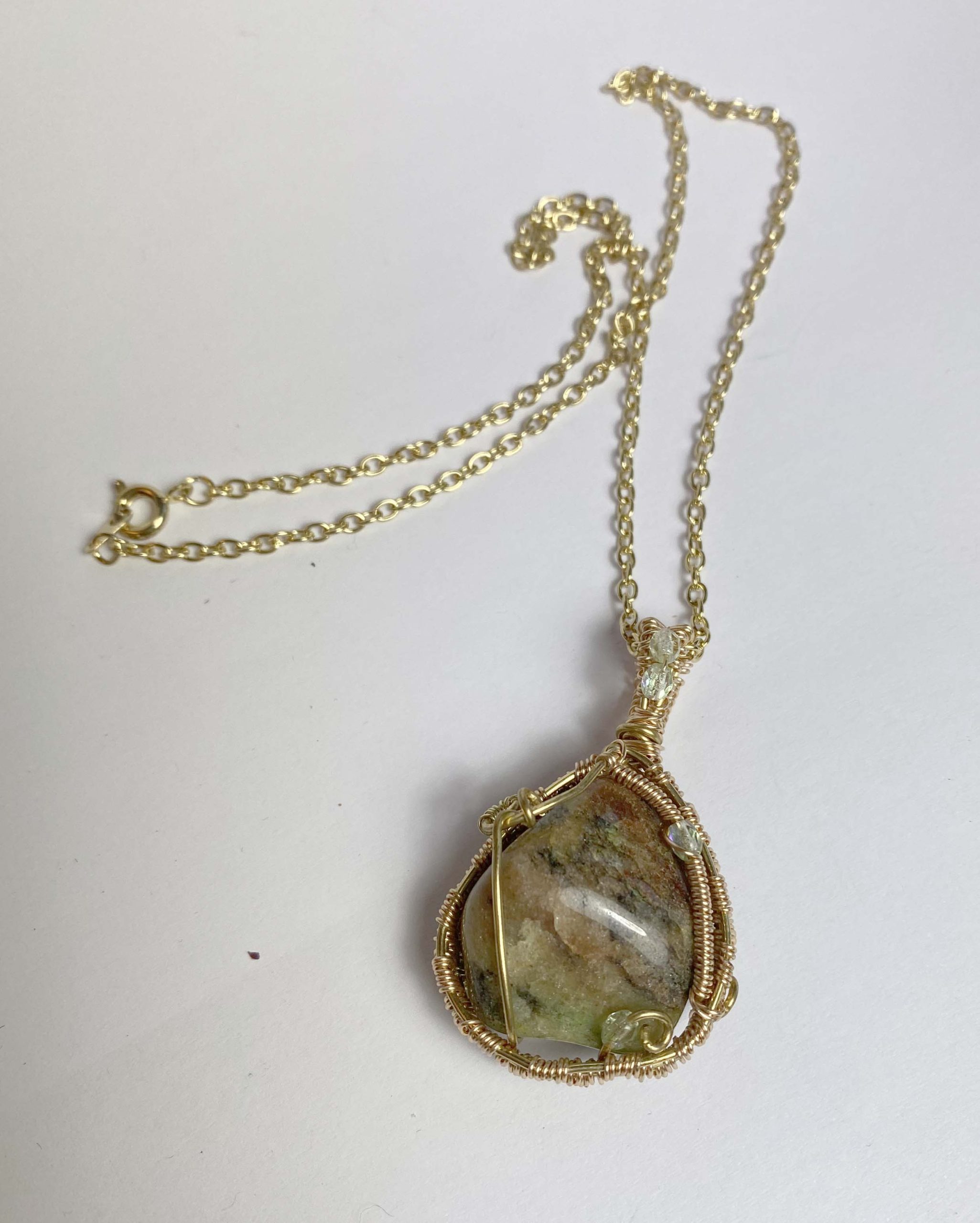 Clearance Pendant: Tumbled natural agate wrapped in gold col. wire