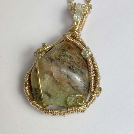 Clearance Pendant: Tumbled natural agate wrapped in gold col. wire
