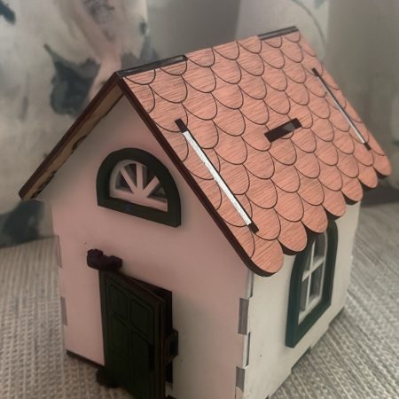 Personalised cottage money box.