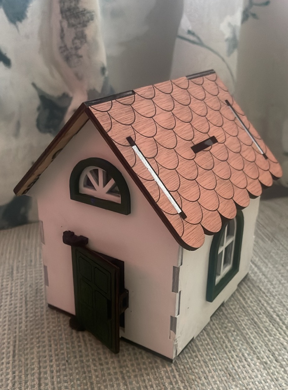Personalised cottage money box.
