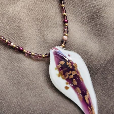 White and Burgundy resin pendant on a beaded necklace