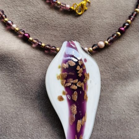 White and Burgundy resin pendant on a beaded necklace