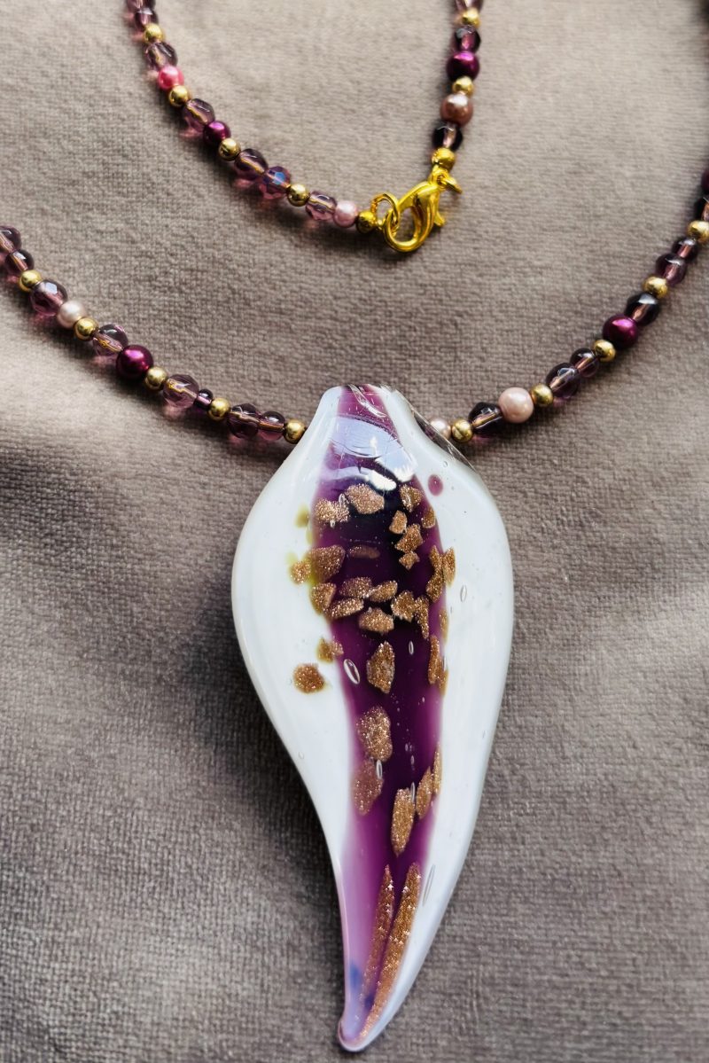 White and Burgundy resin pendant on a beaded necklace