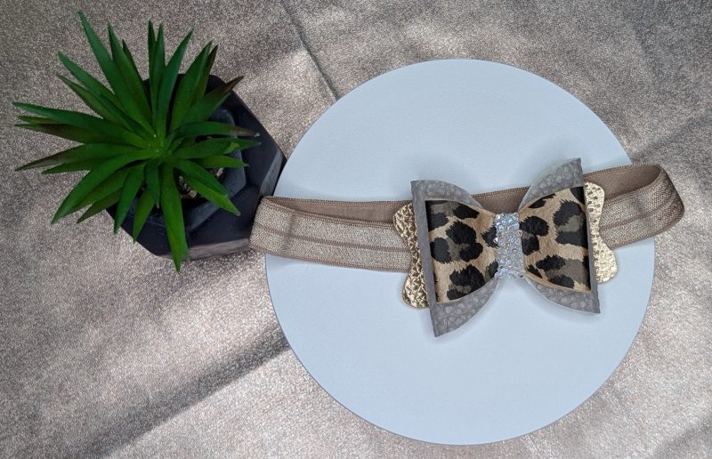 Faux leather leopard print hair bow -with lined hair clip