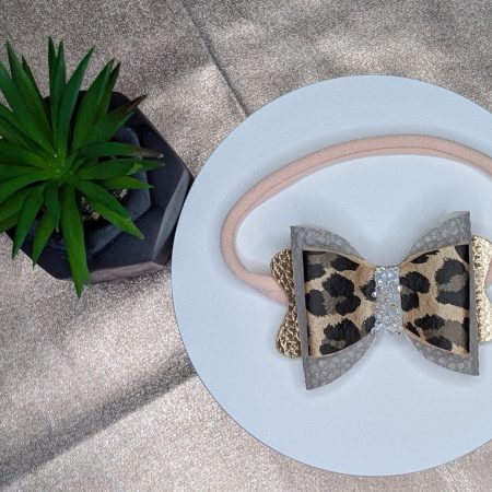 Faux leather leopard print hair bow -with lined hair clip