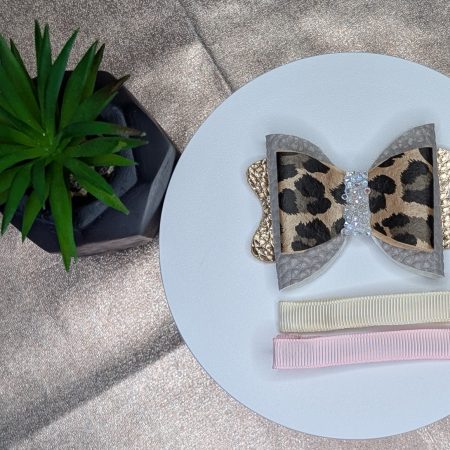 Faux leather leopard print hair bow -with lined hair clip