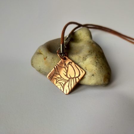 Handcrafted Copper Pendant with Floral Engraving