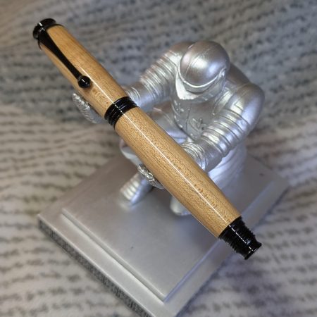 Omega style wooden rollerball made from maple with black fittings