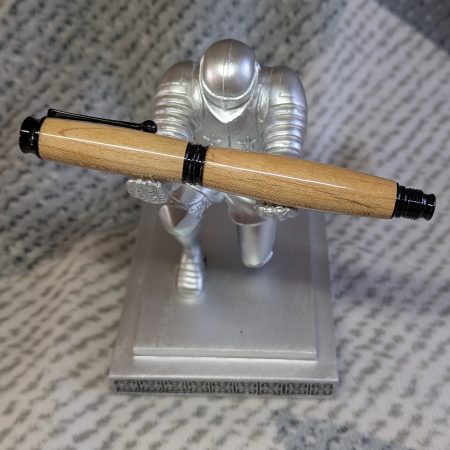 Omega style wooden rollerball made from maple with black fittings