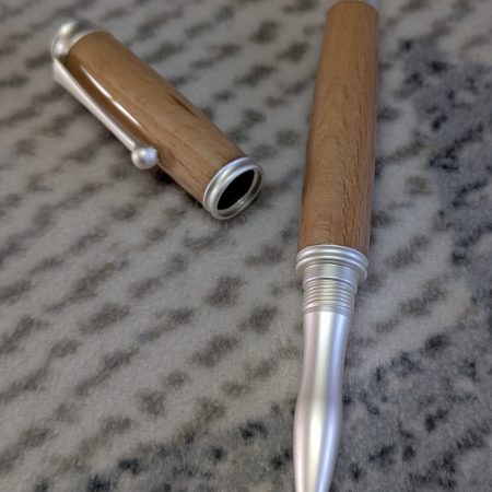 Omega style wooden rollerball made from beech with satin silver fittings