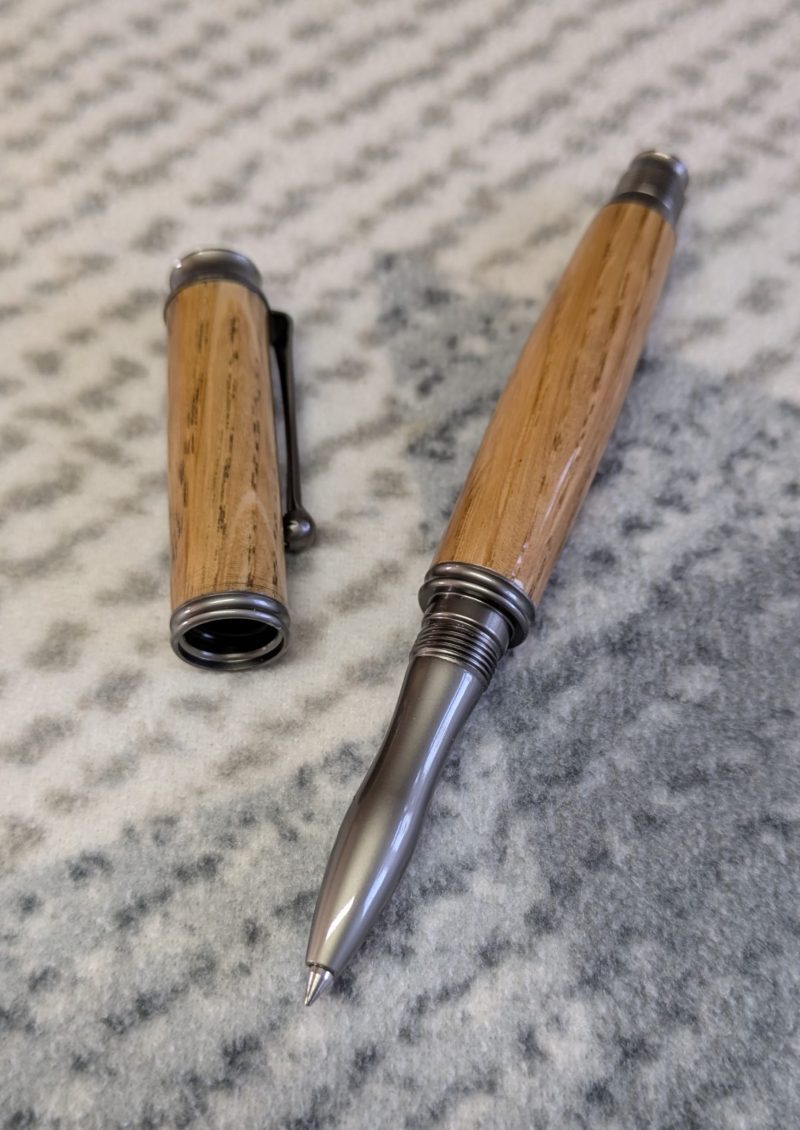 Omega style wooden rollerball made from oak with gun metal fittings