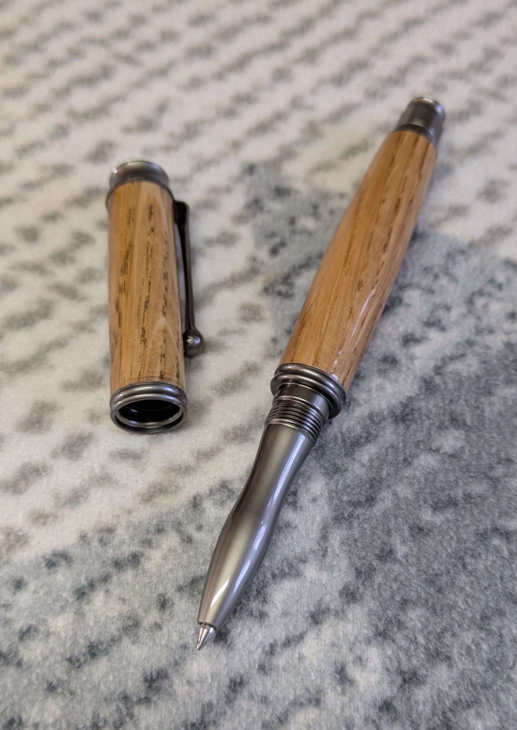 Omega style wooden rollerball made from oak with gun metal fittings