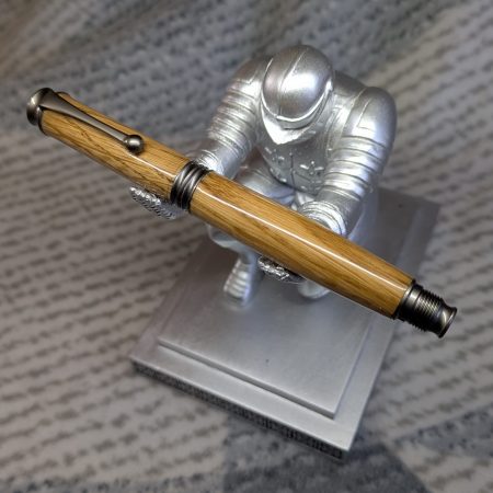 Omega style wooden rollerball made from oak with gun metal fittings