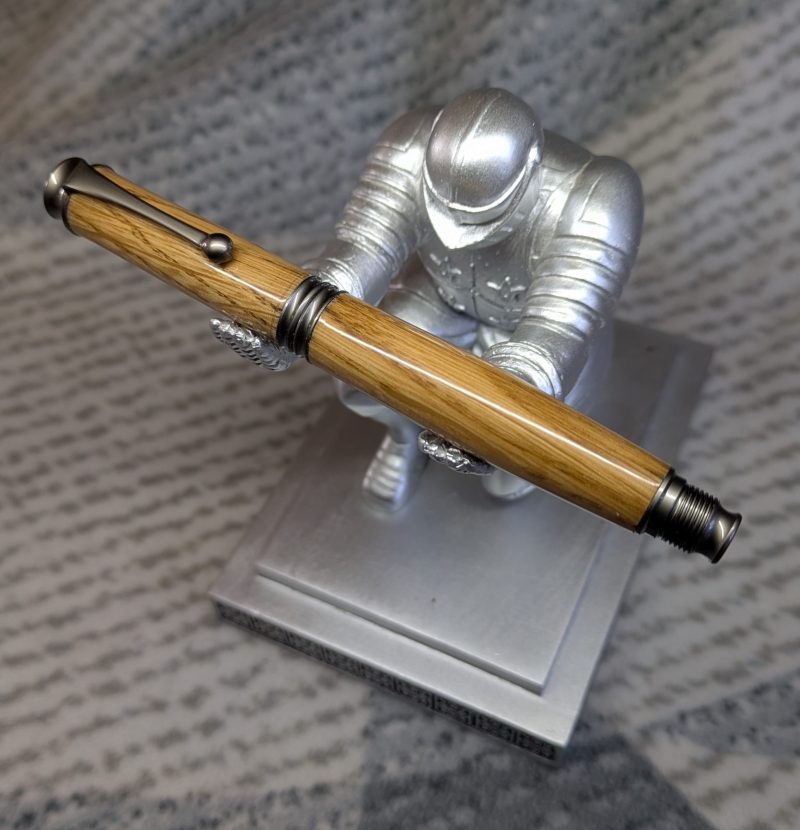 Omega style wooden rollerball made from oak with gun metal fittings