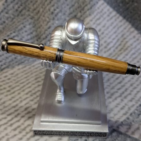 Omega style wooden rollerball made from oak with gun metal fittings