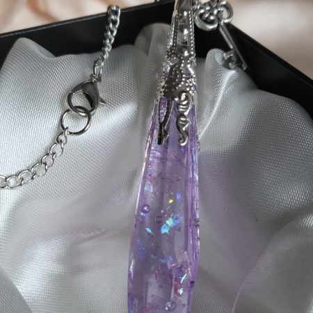 Purple shimmering potion themed crystal pendant necklace