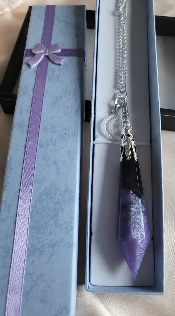 Purple and black galaxy themed resin Crystal pendant necklace