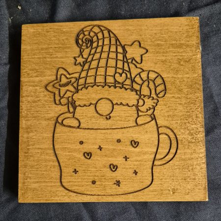 laser engraved wooden gnome coaster