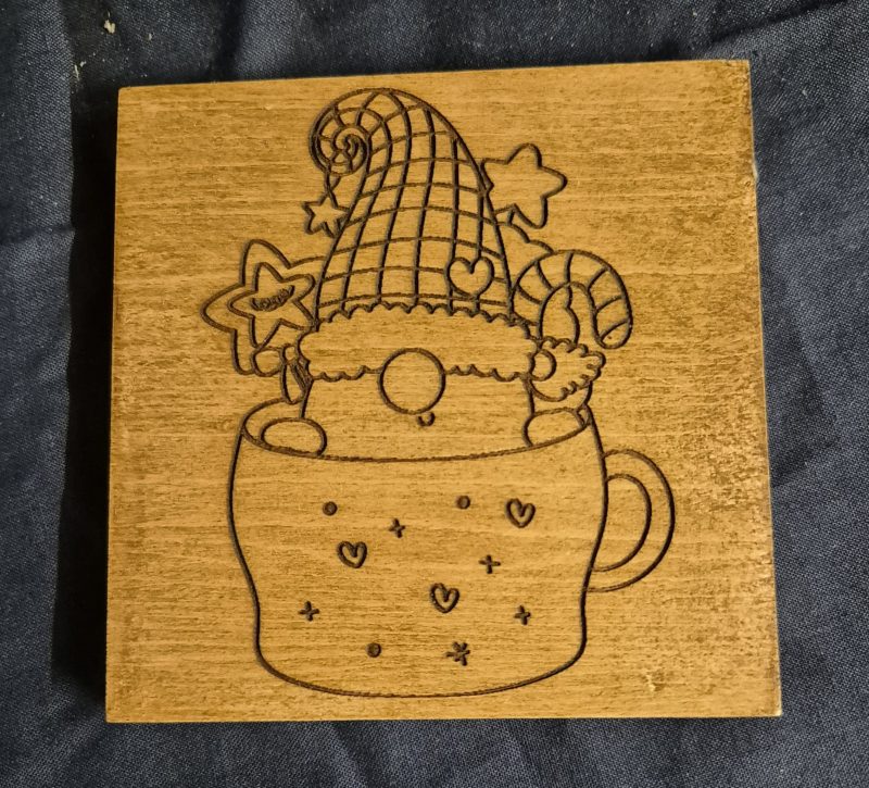 laser engraved wooden gnome coaster